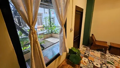 Căn hộ một phòng ngủ có ban công — Nhà Cuội Boutique Aparthotel - Private yet Connected